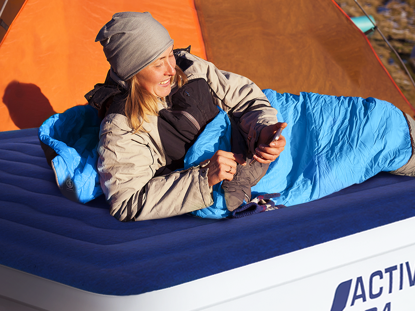 Blow up bed top with sleeping bag